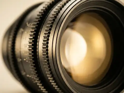 Macro detail of a cinema lens aperture ring and front element