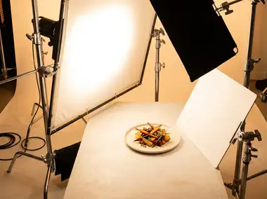 Lighting setup shaping a food set